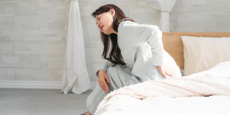 痛む女性